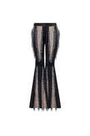 Handwoven panelled boot-cut trousers by AKHL, featuring textured fabric and tailored fit in a stylish design.