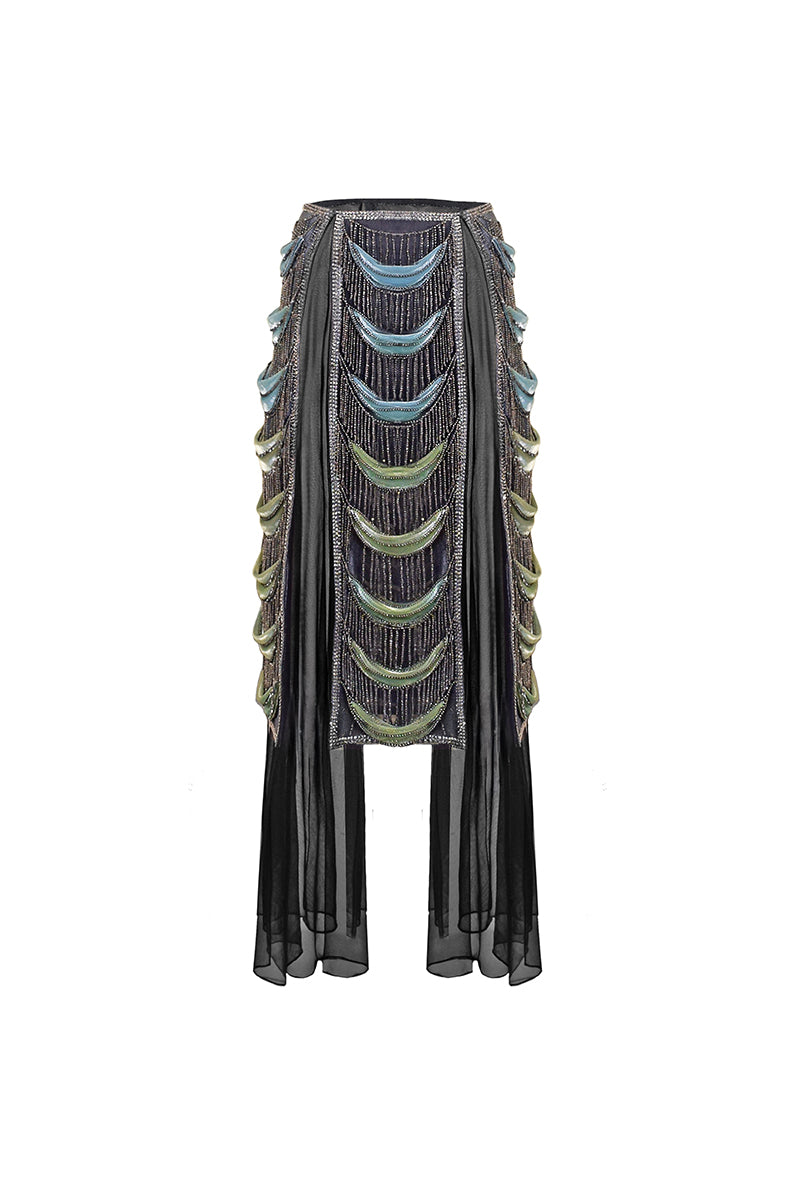 Sheer panelled fringe maxi skirt by AKHL featuring see-through fabric and layered fringe details.