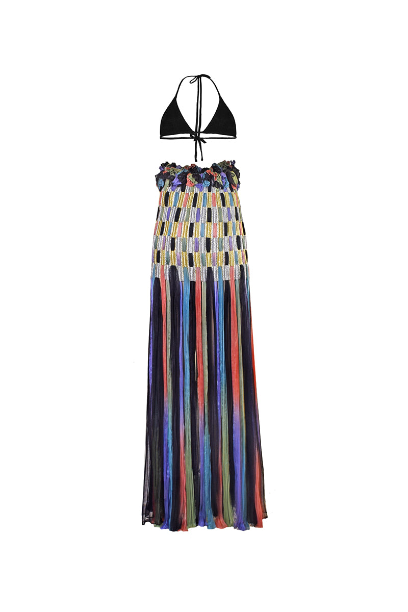 Black AKHL dimensional column maxi skirt with a flowing silhouette, styled with a high waist and elegant drape.