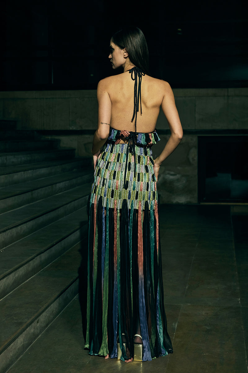A stylish AKHL dimensional column maxi skirt in a flowing fabric, featuring a sleek, modern design perfect for elegant casual wear.
