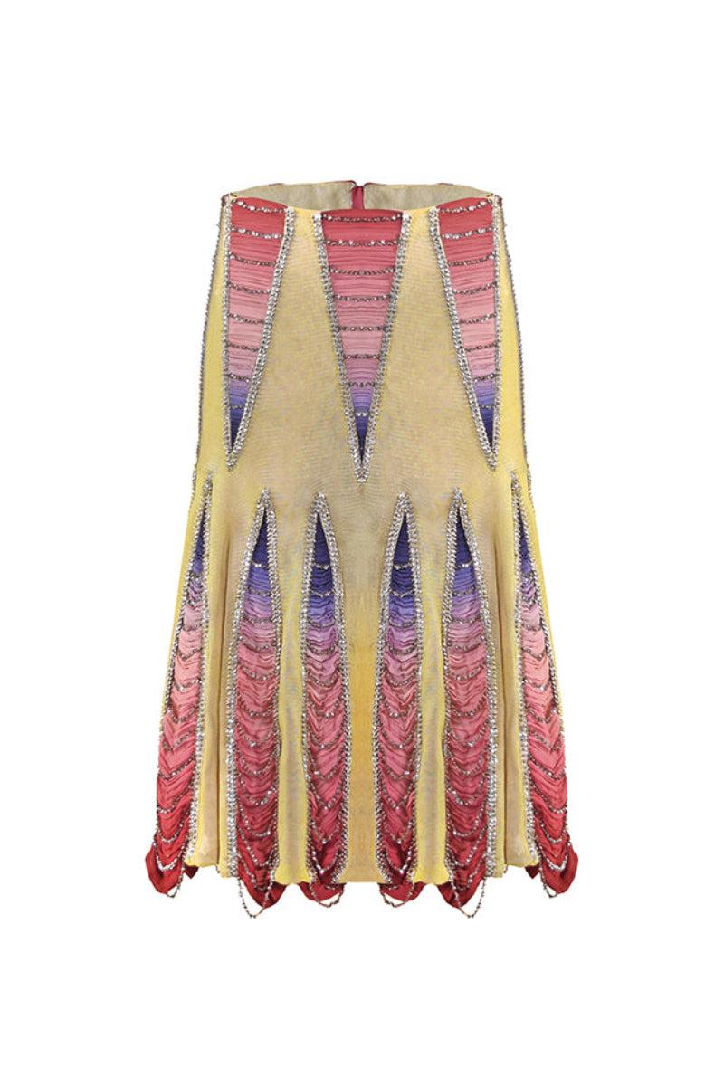 Light grey low-waist panelled midi skirt by AKHL featuring a fitted waist and flowing hem, styled on a mannequin.