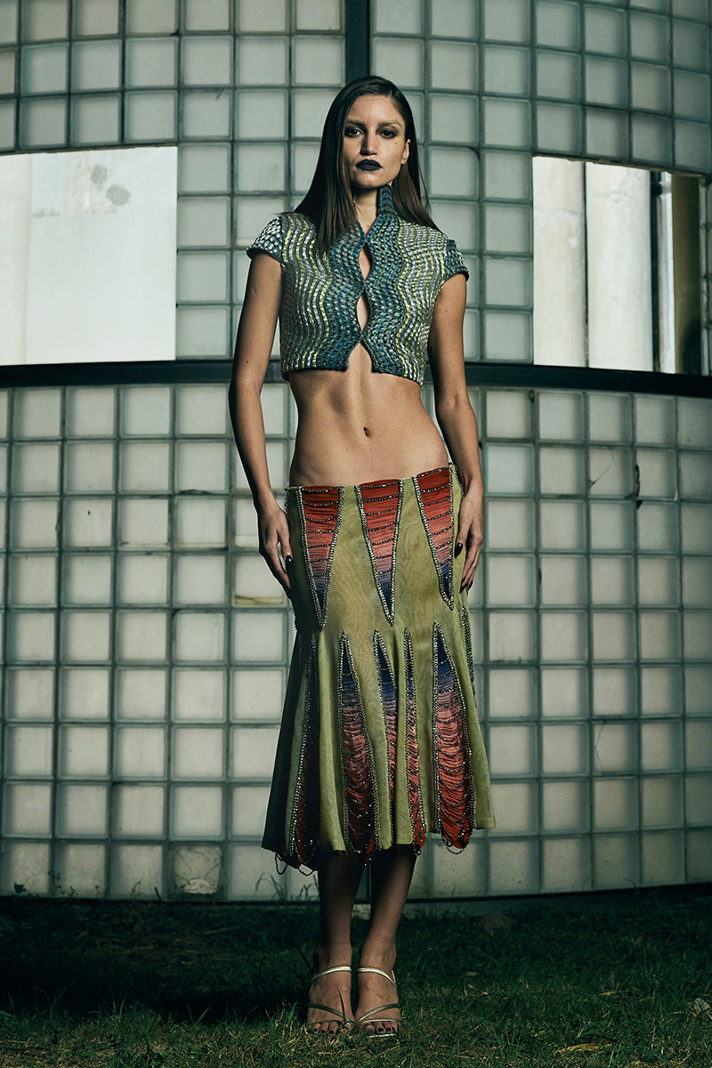 Low-waist panelled midi skirt by AKHL, featuring a sleek design with panels and a midi length, shown in the product image.