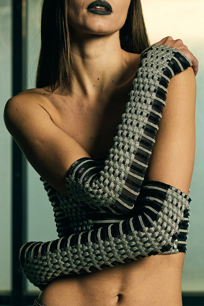 Handwoven sculpted sheer corset top by AKHL featuring intricate woven design and fitted silhouette, perfect for stylish layered looks.