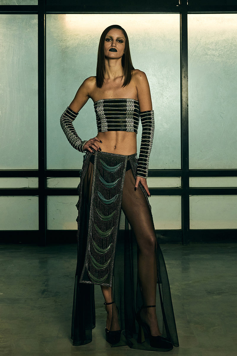 Handwoven sculpted sheer corset top by AKHL featuring intricate craftsmanship and lightweight, see-through fabric.