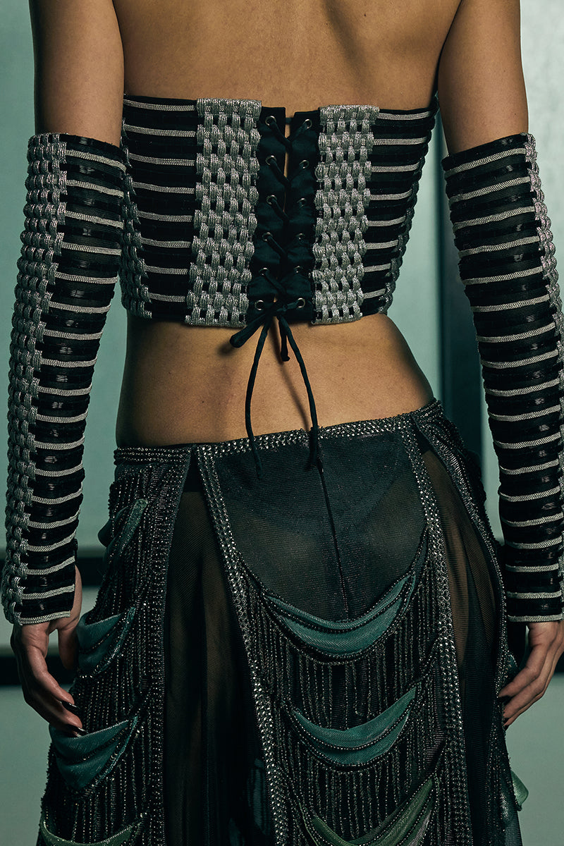Handwoven sculpted sheer corset top by AKHL featuring intricate woven details and a fitted design.