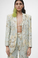 Multicolor tie-dye oversized sequin blazer by JC Pajares featuring vibrant, multicolored sequins and a relaxed fit style.