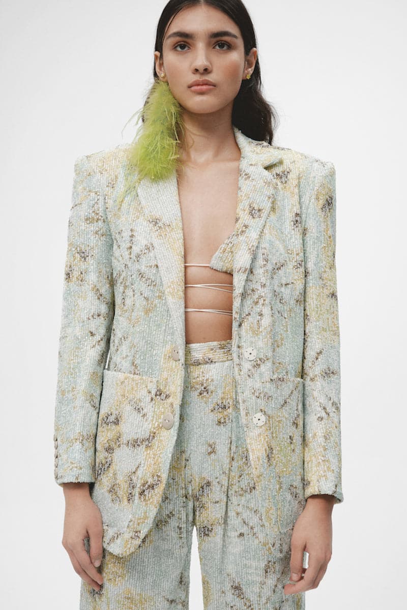 Multicolor tie-dye oversized sequin blazer by JC Pajares featuring vibrant, multicolored sequins and a relaxed fit style.