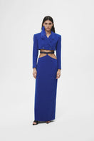 Blue crossed crop blazer by JC Pajares, featuring a stylish design with structured shoulders and a fitted silhouette.