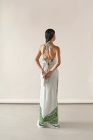Green print Amal maxi skirt by Tinta Latina featuring flowy fabric and a stylish, vibrant design.