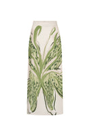 Green print Amal maxi skirt by Tinta Latina, flowing fabric with vibrant floral pattern, casual and stylish for warm weather.