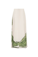 Green printed Amal Maxi Skirt by Tinta Latina, flowing fabric with vibrant floral pattern, stylish and comfortable for casual wear.