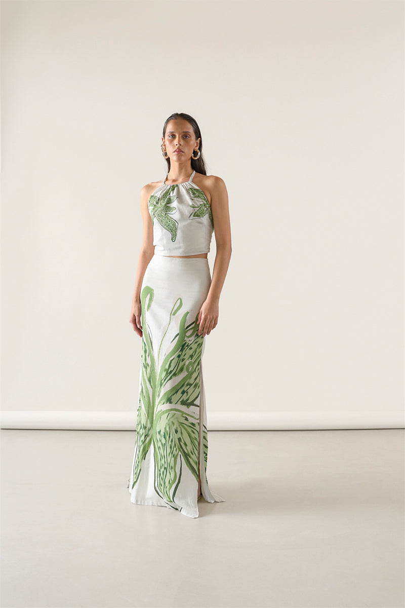 Green print Amal maxi skirt by Tinta Latina featuring a flowy design and vibrant pattern, perfect for casual or dressy occasions.