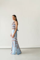 Soft blue Amal maxi skirt by Tinta Latina, flowing fabric and elegant design, perfect for casual or dressy occasions.