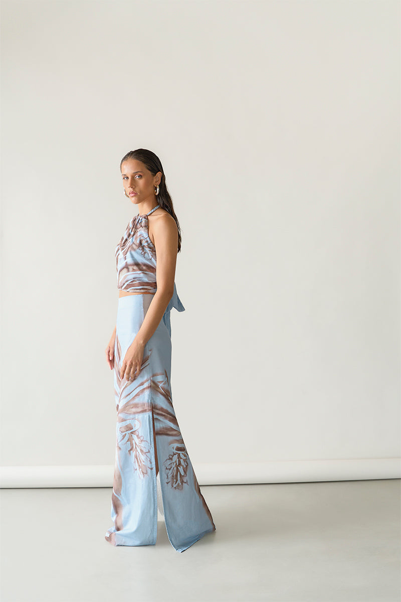 Soft blue Amal maxi skirt by Tinta Latina, flowing fabric and elegant design, perfect for casual or dressy occasions.