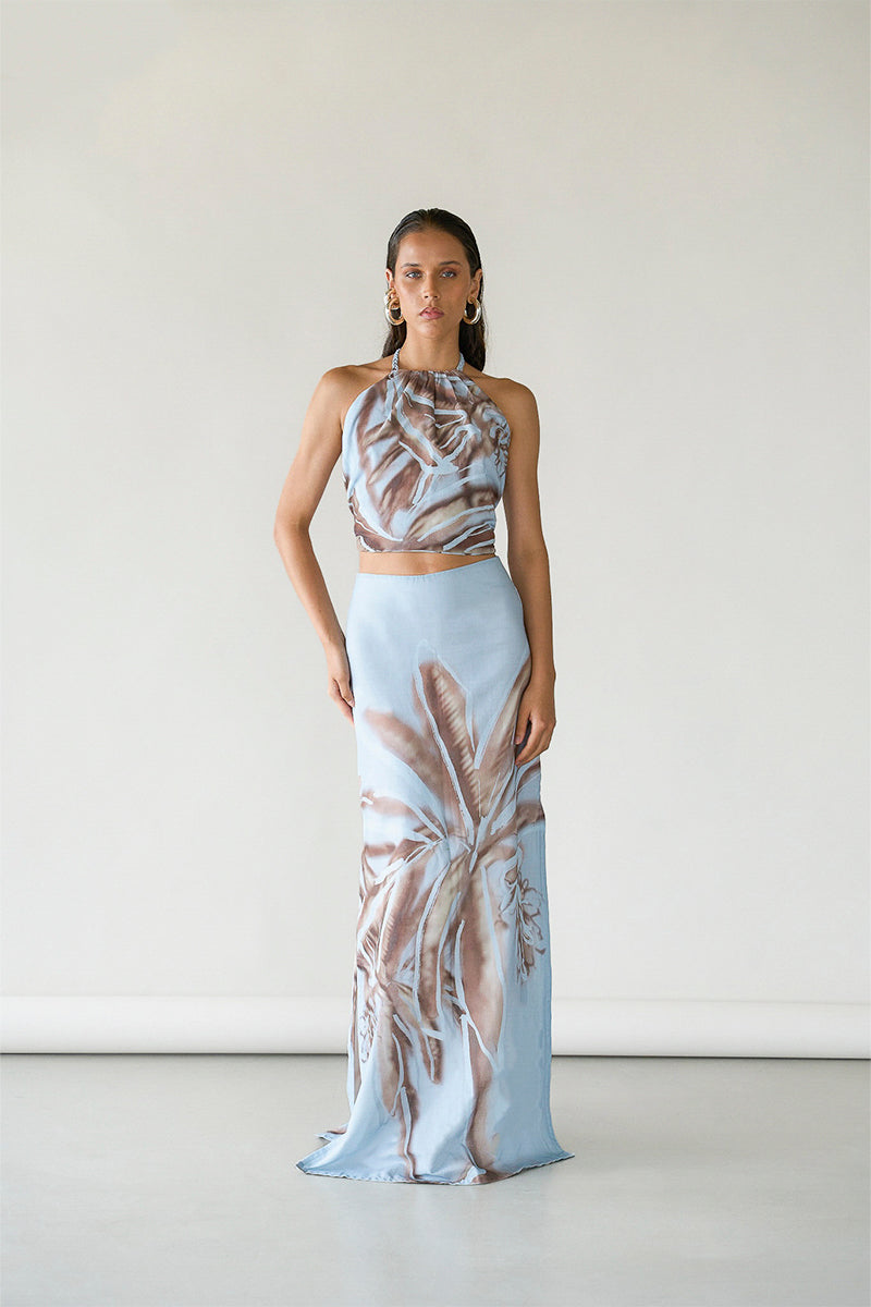 Tinta Latina Amal maxi skirt in soft blue fabric, flowing design with a high waist and elegant style.