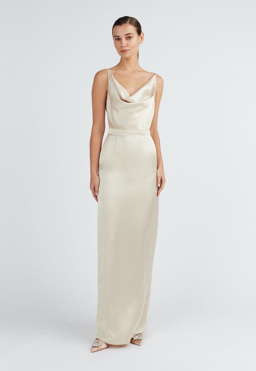 Undress beige satin backless maxi dress with flowing fabric and elegant design, perfect for formal occasions.