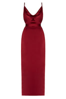 Deep red backless gown by UNDRESS, featuring a flowing design and elegant style, perfect for evening occasions.