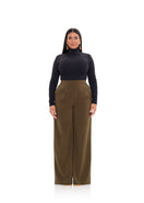 Olive Atta bootcut pants by Andrea Iyamah displayed on a plus-size model, showcasing the stylish and comfortable design.