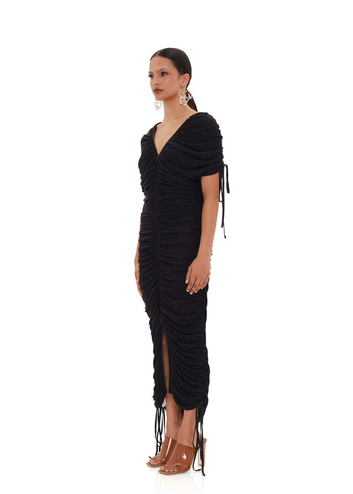 Black Ratu Mesh Dress by Andrea Iyamah, a stylish maxi dress with sheer mesh fabric, shown from side view.