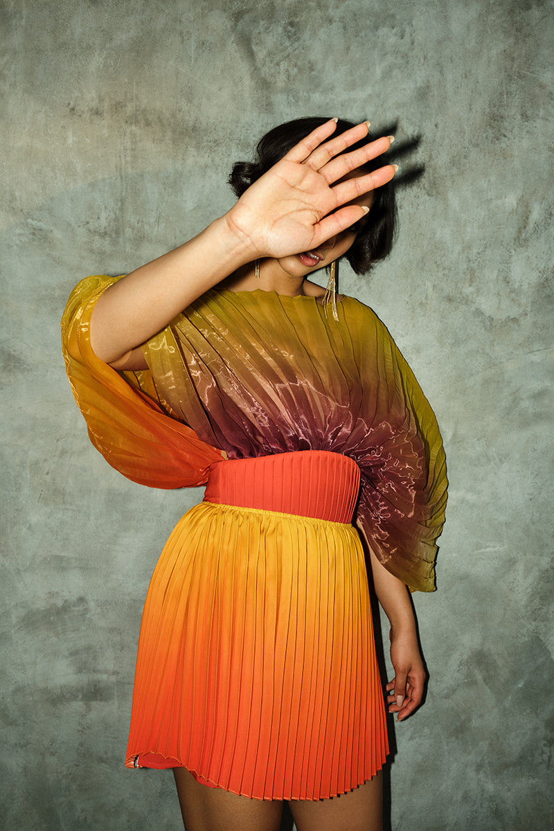 KATA PLEATED MINI SKIRT IN ADWA RED PRINT - CULT MIA