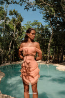 Andrea Iyamah RIZO Powder Peach corset mini skirt on model, showing fitted waist and stylish mini length in a fashion look.
