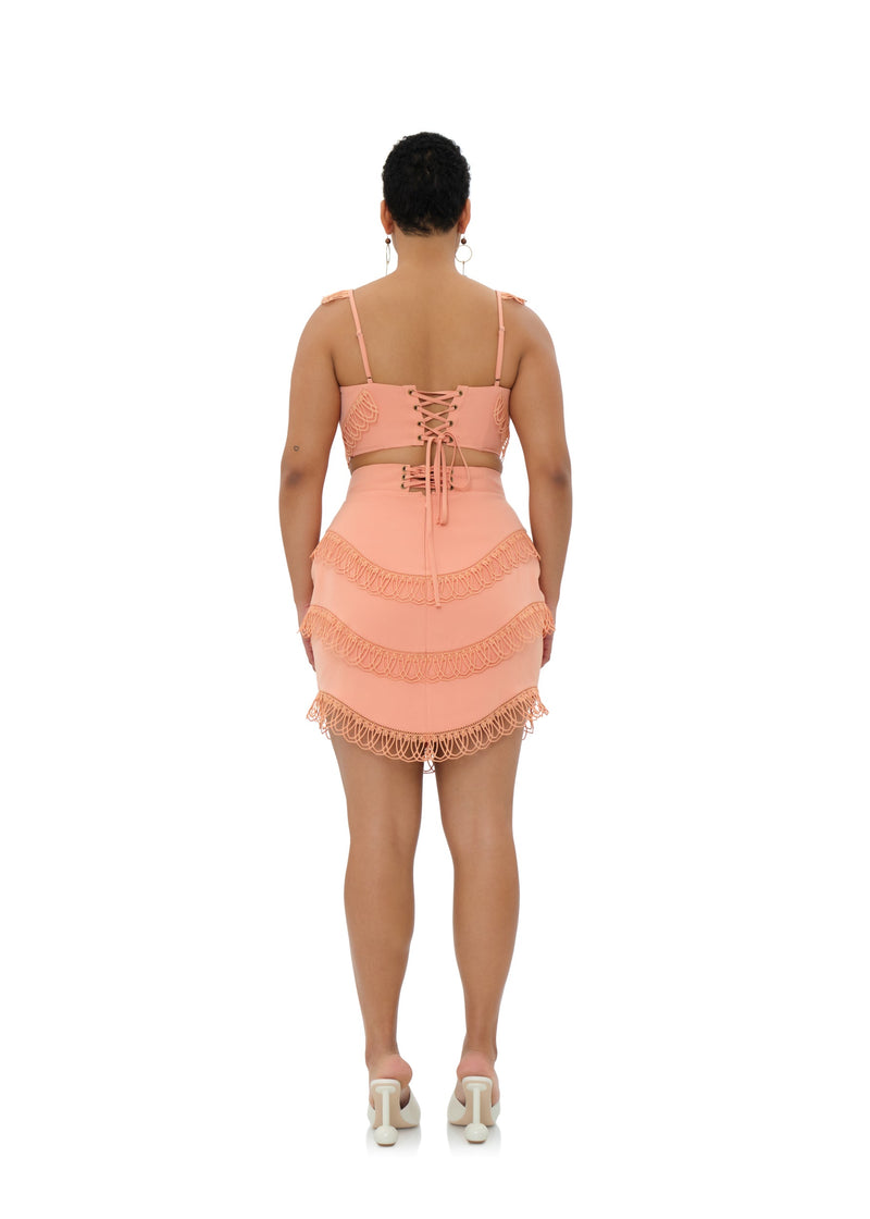 Pink peach RIZO powder corset mini skirt by Andrea Iyamah with a fitted waist and stylish design.