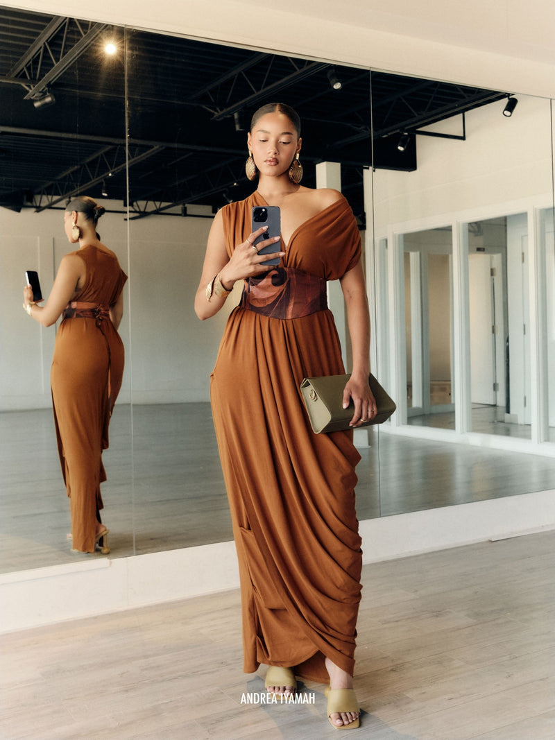 Andrea Iyamah ADI Knit Kaftan Dress in a cozy fall-winter maxi dress design, shown in a mirror selfie.