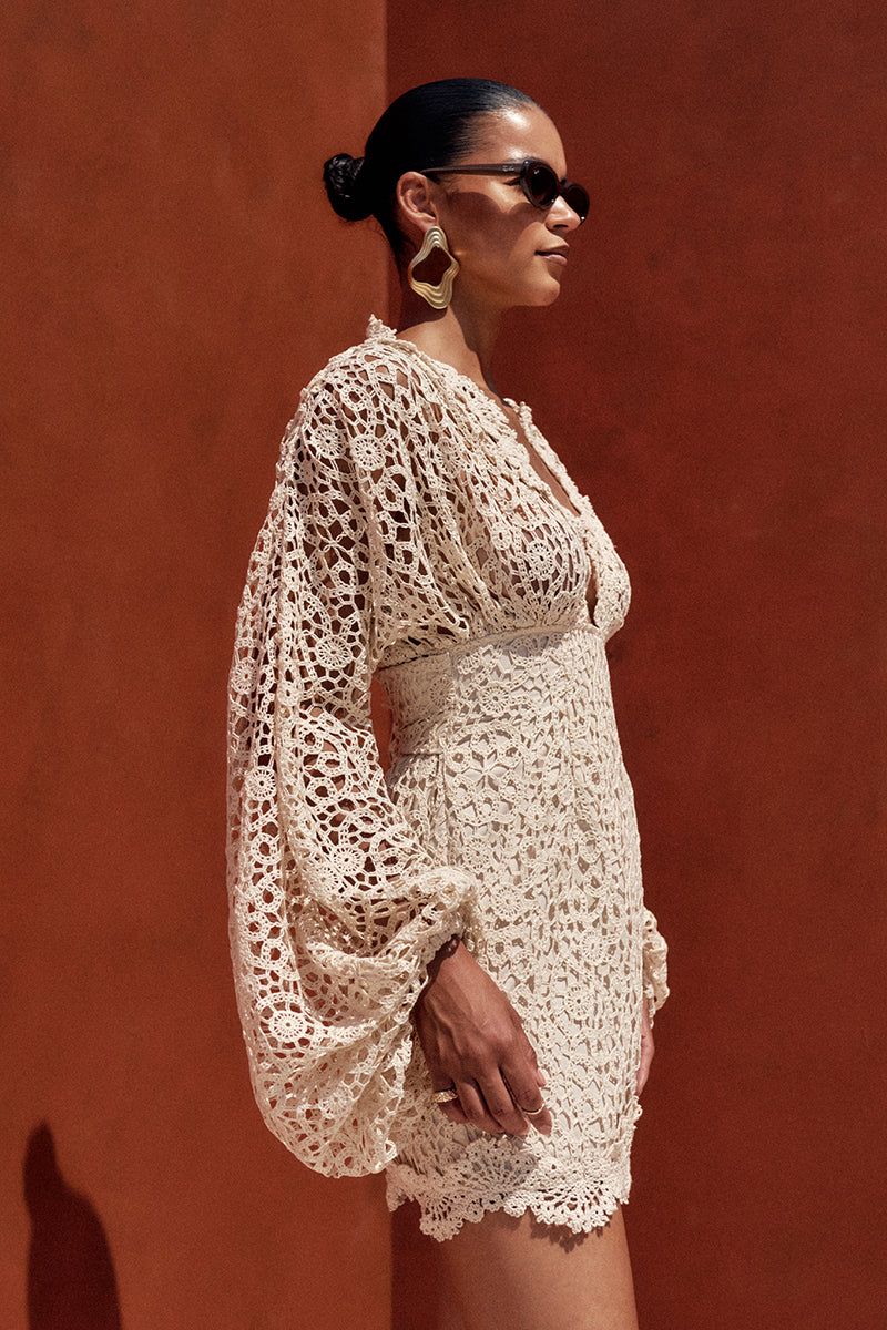 Ivory Dani Mini Lace Dress by Andrea Iyamah, featuring delicate lace fabric and a stylish mini length, perfect for elegant occasions.