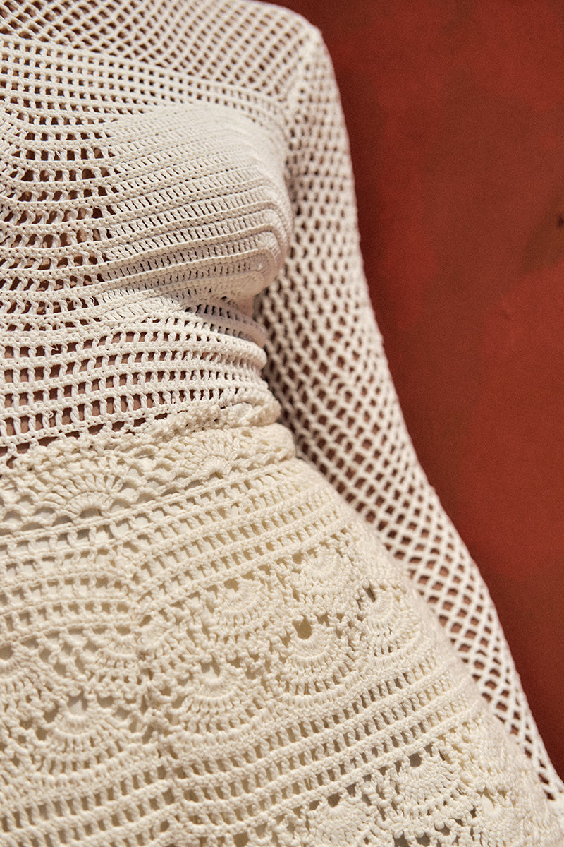 Andrea Iyamah MUNA crochet shorts in ivory, showcasing lightweight, textured fabric with a relaxed fit and delicate crochet details.