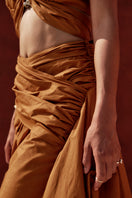 Burnt orange GIA crop top by Andrea Iyamah, featuring a stylish design with a fitted silhouette and fashionable details.