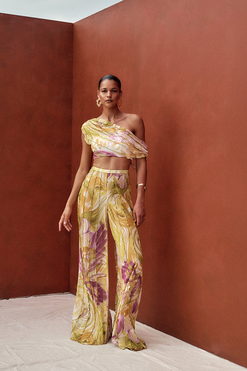 Andrea Iyamah FARA Mesh Crop Top in Vibra Print, featuring a vibrant patterned design and lightweight mesh fabric.