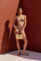 Andrea Iyamah DOLA Bikini Bottom in Vibra Print featuring vibrant, colorful patterns and a stylish fit for beachwear.