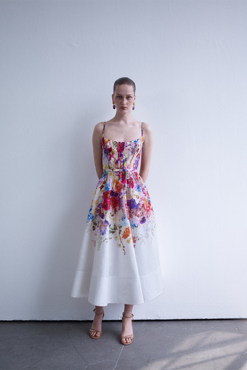 AISA Anemone midi dress featuring a flowing fabric, floral pattern, and midi length, perfect for elegant occasions.