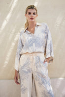 White Ankara blouse from Tinta Latina featuring vibrant print, stylish tops design, perfect for casual or dressy occasions.
