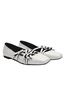 White Christin Wu Annaya flats with sleek slip-on design and pointed toes, perfect for casual or dressy occasions.