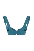 Blue-green Anne bra by IKINITA with adjustable straps, shown from the back, highlighting the supportive design and smooth fabric.