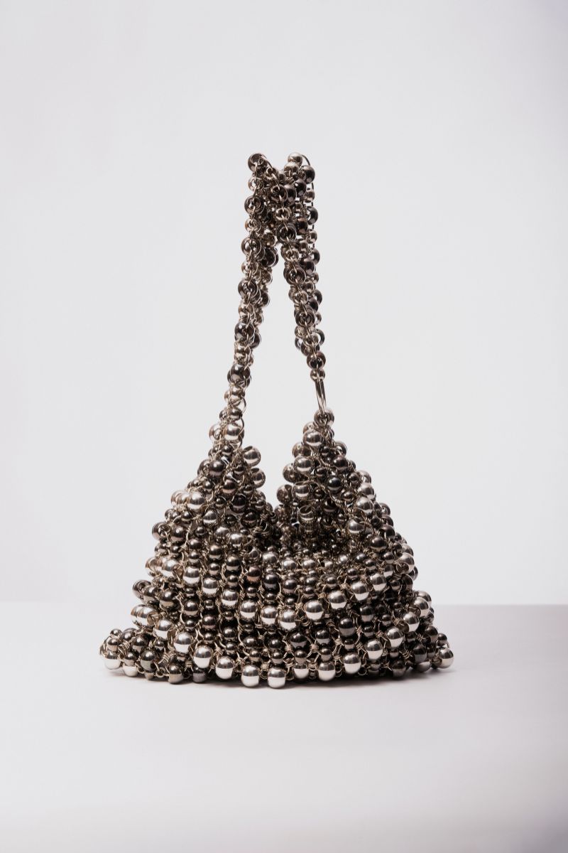 Silver Annie shoulder bag by Millanne Tale featuring pearl accents and a sleek, modern design.