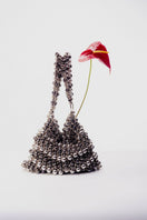 Silver Annie shoulder bag by Millanne Tale with pearl accents, featuring a sleek design and adjustable shoulder strap.