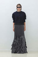 Hand embroidered anthrasite whale maxi skirt by TAGG, featuring intricate whale designs on flowing fabric.