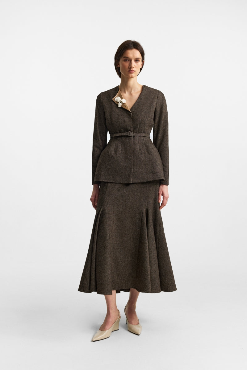 PODYH Seccessia midi skirt in rich brown with elegant flowy fabric and a sleek, stylish design for versatile wear.