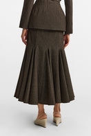 PODYH Secessia midi skirt in rich brown fabric, stylish knee-length skirt with a fitted waist and flowing A-line silhouette.