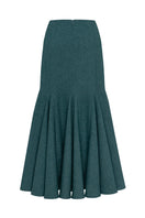 Podyh Secessia midi skirt in rich teal fabric, shown in a close-up view highlighting its flowy design and vibrant color.