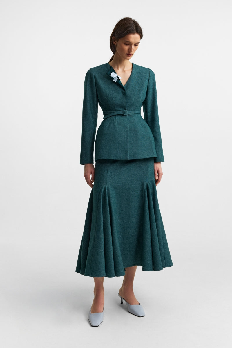 Podyh Secessia teal midi skirt with a flowy silhouette, styled with a smooth fabric and elegant length.