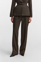 Podyh Seccessia pants in rich brown, stylish and comfortable pants with a tailored fit, displayed on a neutral background.