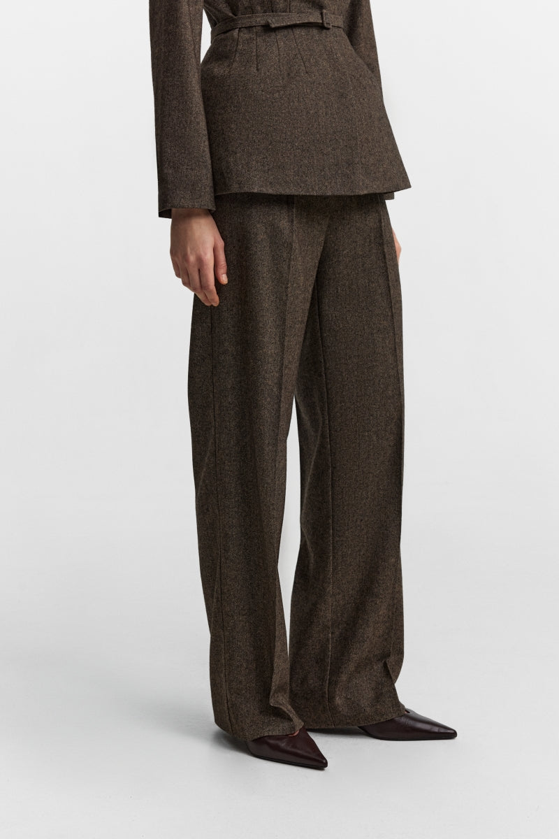 Podyh Seccesia brown pants with a relaxed fit, featuring a comfortable waistband and stylish design, perfect for casual wear.