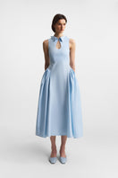 Celestial blue PODYH midi dress with a flowing silhouette and elegant design, displayed on a hanger against a neutral background.