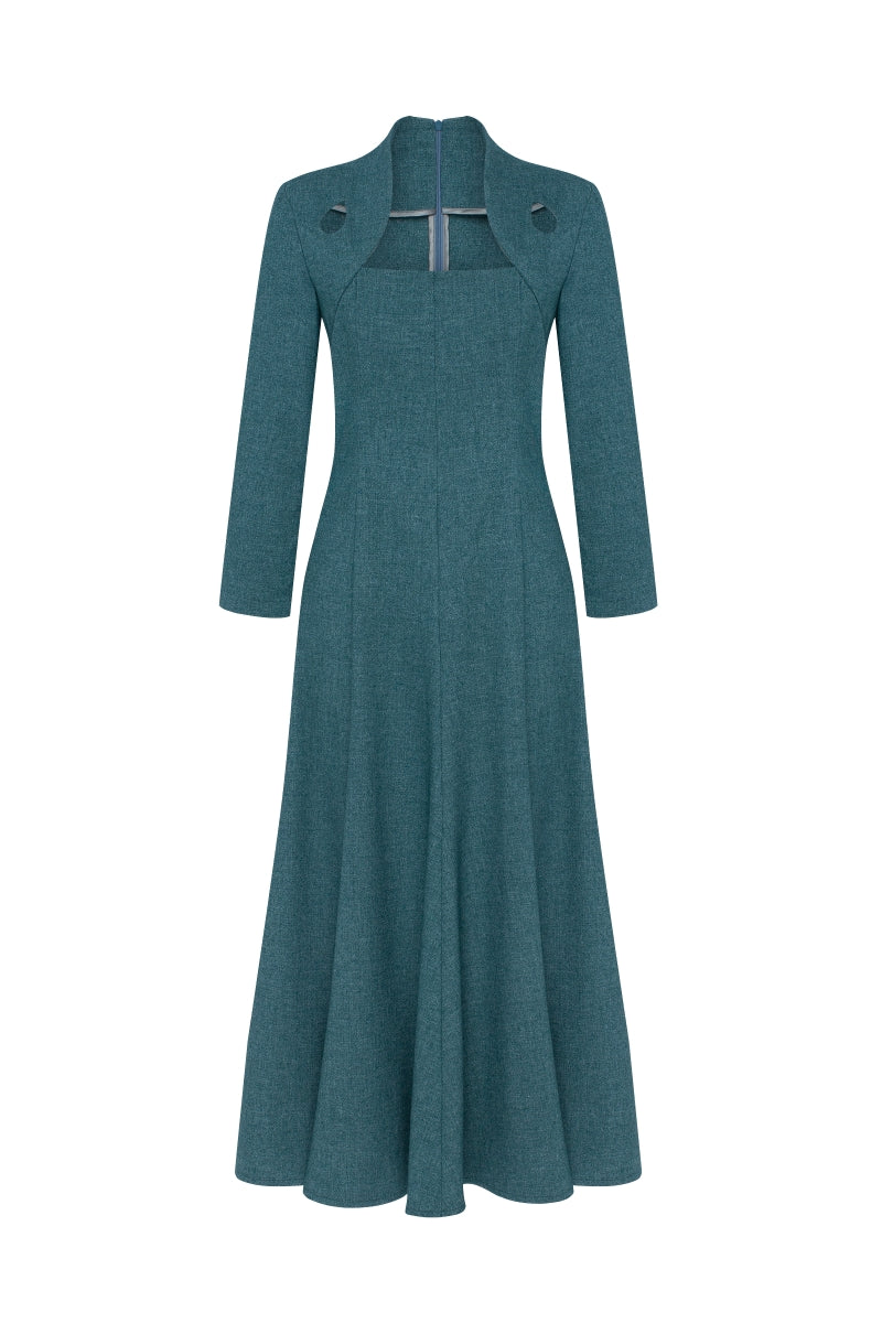 PODYH Edicule teal midi dress with elegant fit and flowy fabric, showcased on a model in a stylish indoor setting.