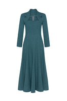 PODYH Edicule teal midi dress with elegant fit and flowy fabric, showcased on a model in a stylish indoor setting.