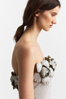 Podyh Capitel stone taupe midi dress with a fitted waist and elegant design, displayed on a mannequin.