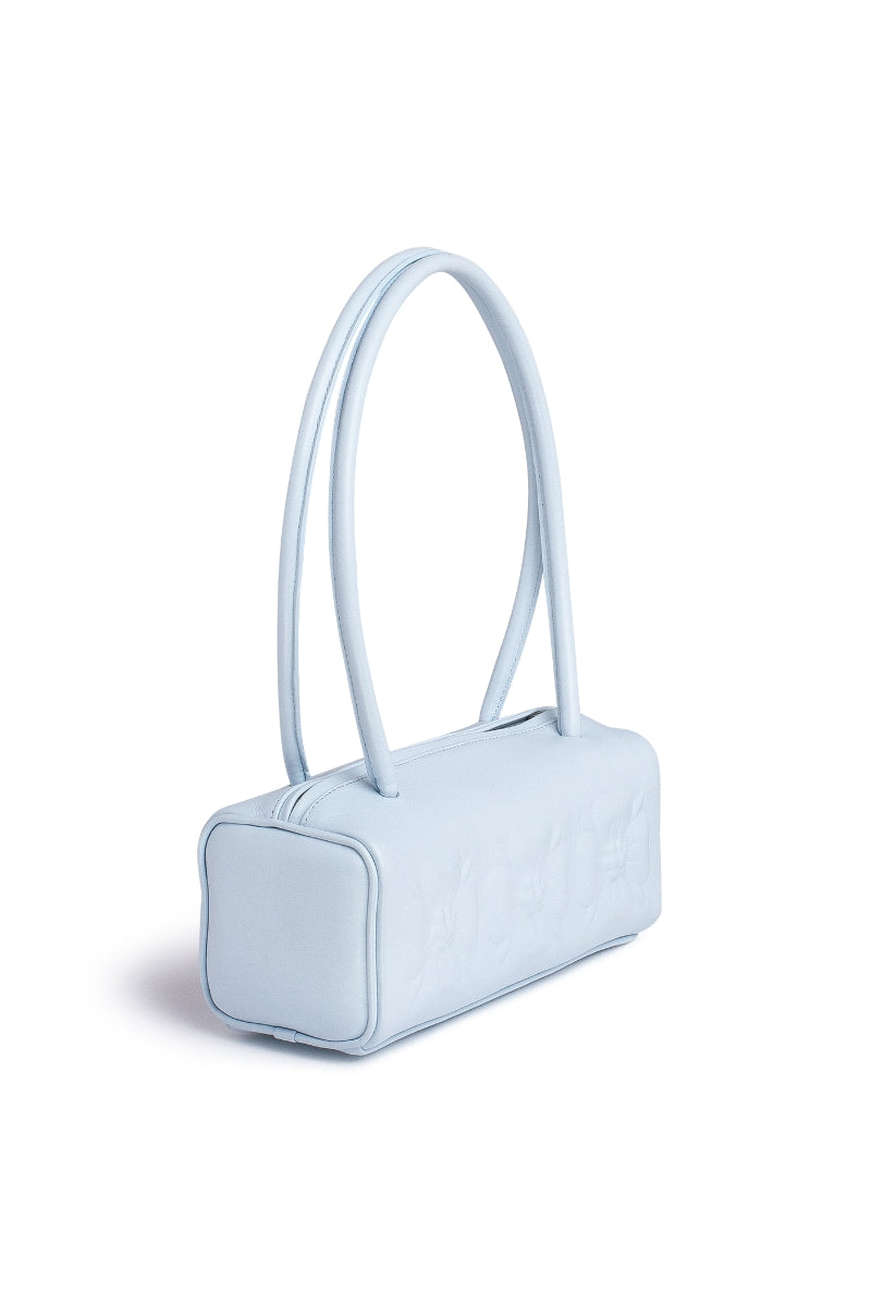 Ice blue PODYH top handle bag with bas relief design, stylish and elegant for everyday use.